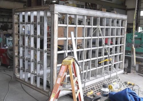 Aquajet services large stainless steel cage weldment