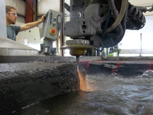 Waterjet cutting a 7' thick ingot of a niobium alloy into slices.