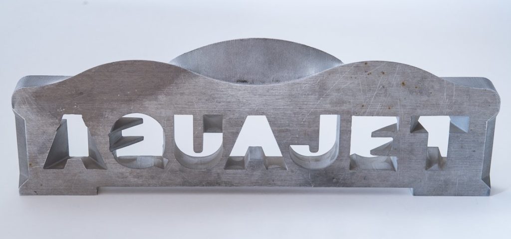 Aquajet services 5 axis waterjet morphed letters - AquaJet Services