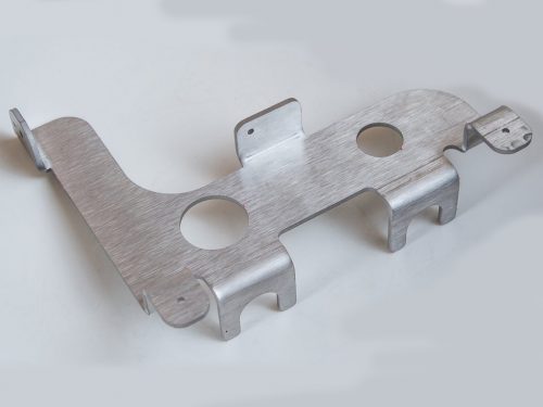 Waterjet cut and formed stainless steel part.