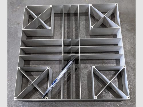 This part was cut for the PMC lab at the University of Texas. The material is 1-3/4" thick 7075 aluminum, and the ribs of this delicate lattice structure are only 1mm (.039") wide!